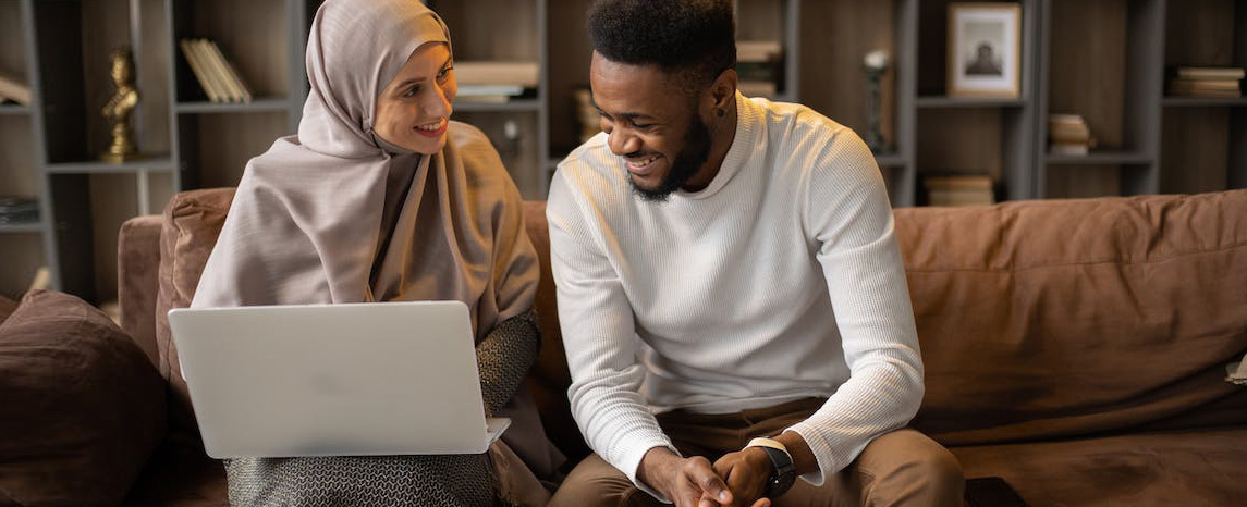 Couple using a laptop computer