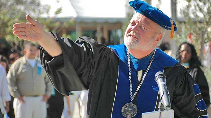 Photo of Richard Tworek, Ph.D in academic regalia.