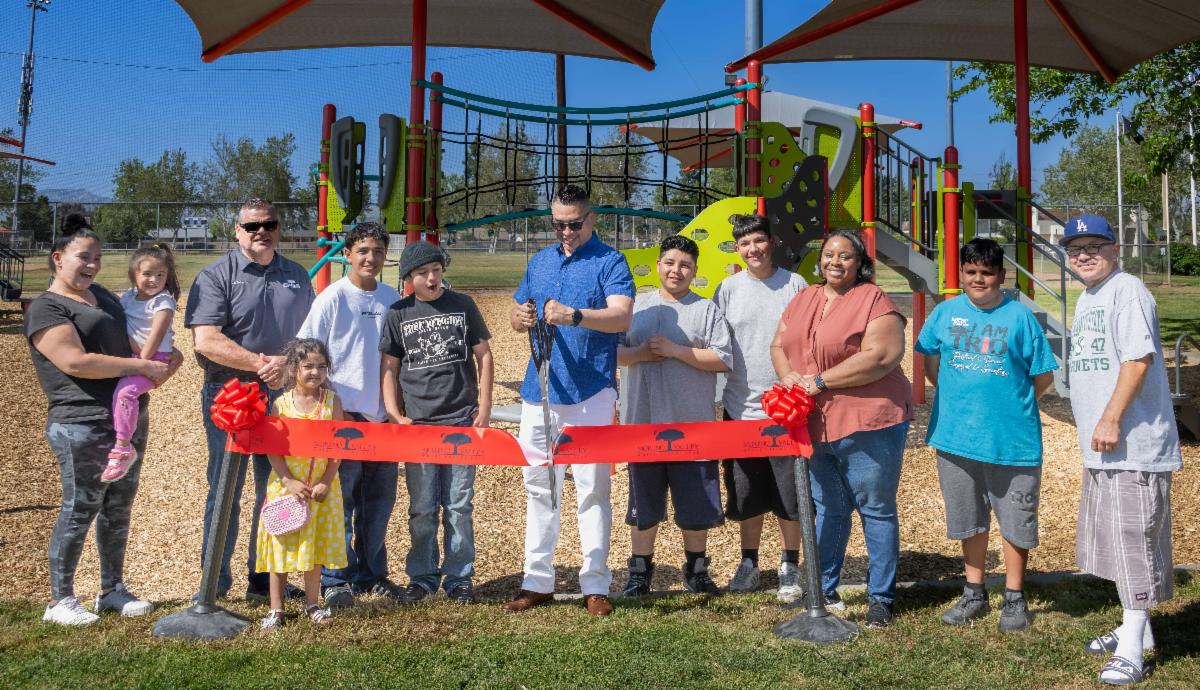 Park dedication ribbon cutting.
